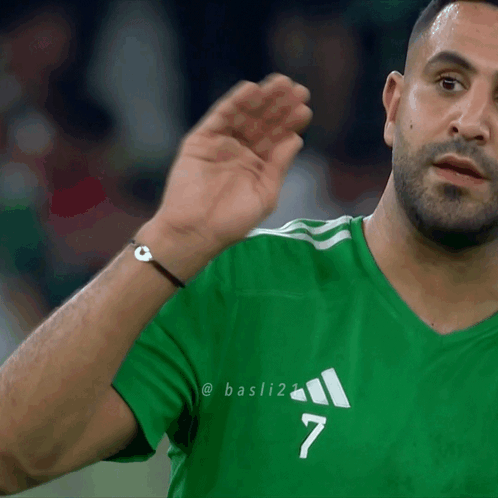 Man in Green Adidas Shirt Number 7
