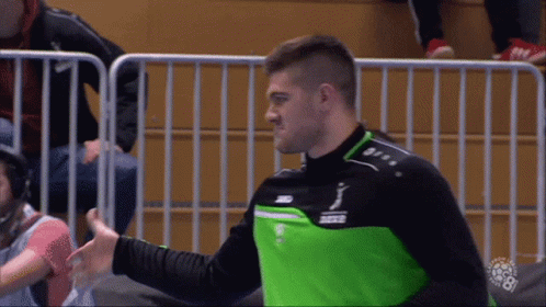 Man In Green And Black Jacket With Jako GIF