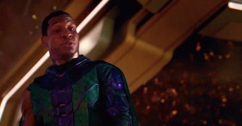 Man in Green and Purple Superhero Costume