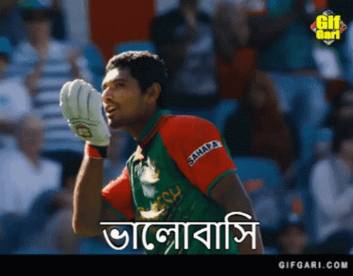 Man in Green and Red Shirt with Sahara