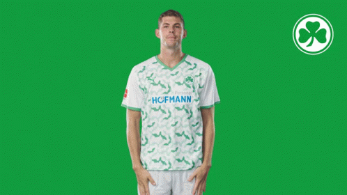Man in Green and White Hofmann Shirt