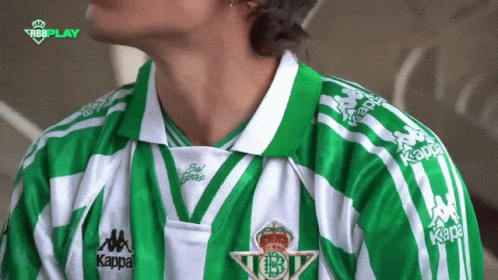 Man in Green and White Kappa Shirt