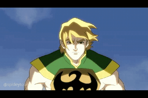 Man in Green and Yellow Holding Skull