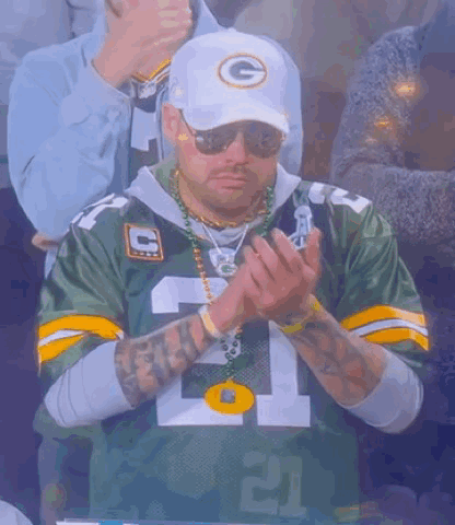 Man In Green Bay Packers Jersey And White Hat Clapping GIF