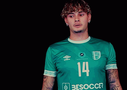 Man in Green Besoccer Jersey