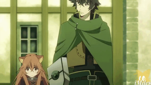 Man in Green Cape Beside Girl With Cat Ears