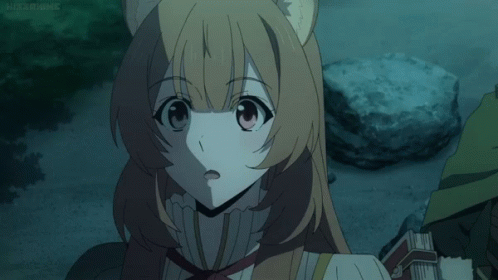 Man in Green Cape Next to Girl with Cat Ear