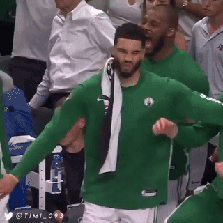 Man in Green Celtics Jersey Dancing