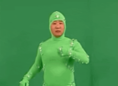 Man In Green Costume GIF