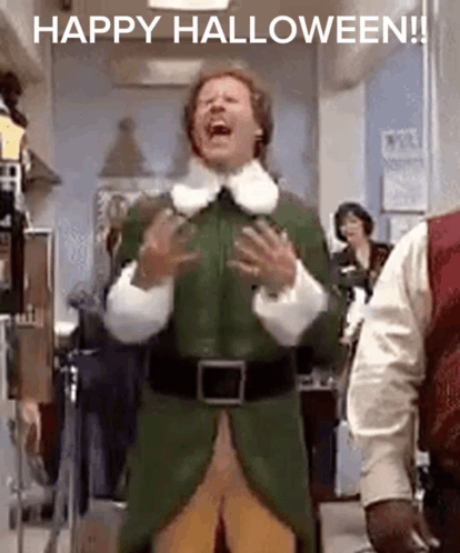 Man in Green Elf Costume Dancing in Hallway
