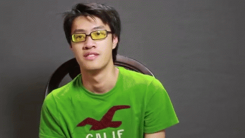 Man In Green Hollister Shirt With Glasses GIF
