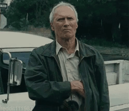 Man in Green Jacket by White Truck reddit111987