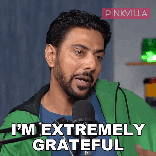 Man in Green Jacket Saying Grateful