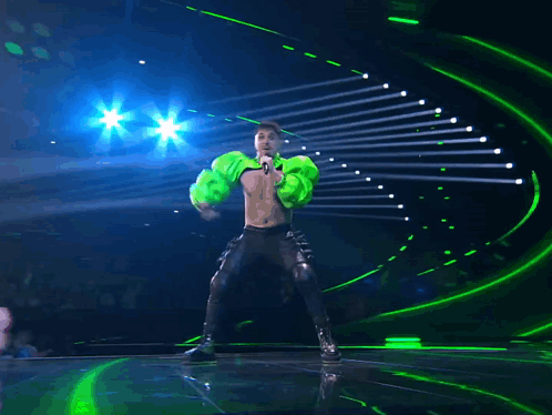Man in Green Jacket Singing