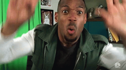 Man In Green Jacket Surprised In Front Of Green Screen GIF
