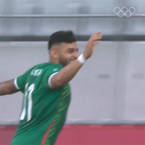 Man in Green Jersey Number 11