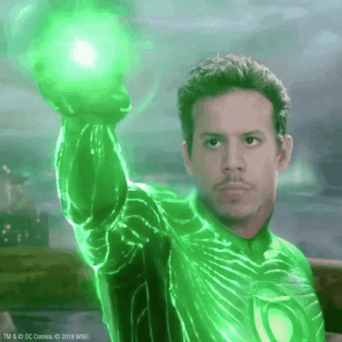 Man in Green Lantern Costume Holding Green Light