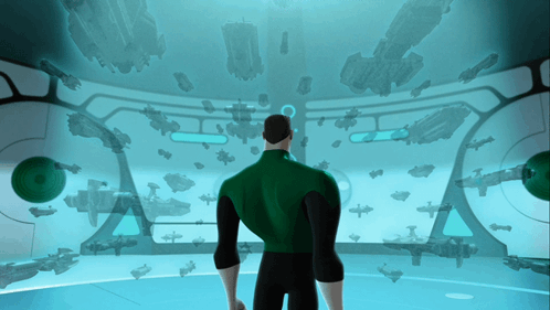Man In Green Lantern Costume In Front Of Screen GIF