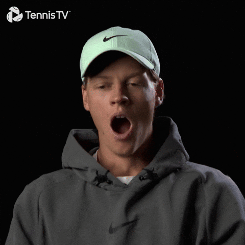 Man In Green Nike Hat And Grey Hoodie Smiling For Tennis TV GIF