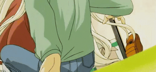 Man In Green Shirt And Blue Jeans Kneeling Next To Blonde Girl GIF
