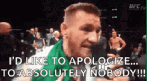Man in Green Shirt Apologizing