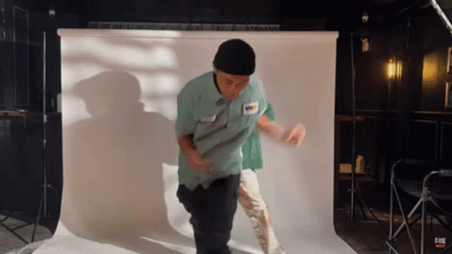 Man In Green Shirt Dancing GIF