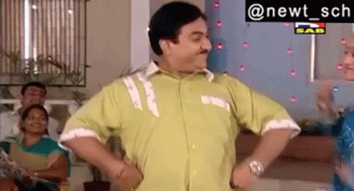 Man In Green Shirt Dancing Hands On Hips GIF