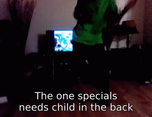 Man In Green Shirt Dancing In Front Of TV The One Specials Needs Child GIF