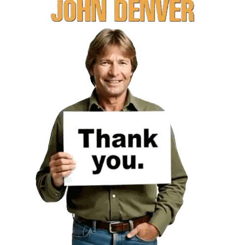 Man in Green Shirt Holding Thank You Sign