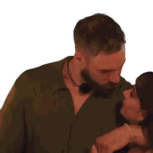 Man in Green Shirt Kissing Woman