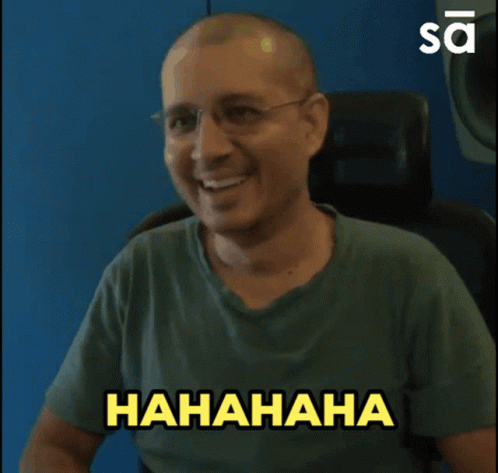 Man in Green Shirt Laughing With Hahaha