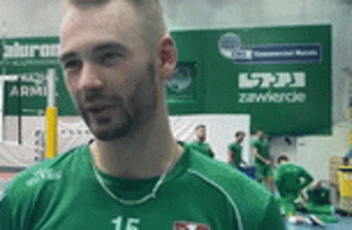 Man in Green Shirt Number 15