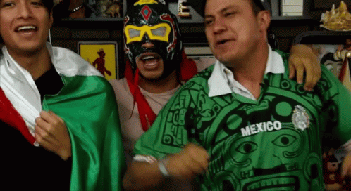 Man in Green Shirt Saying Mexico With Two Men