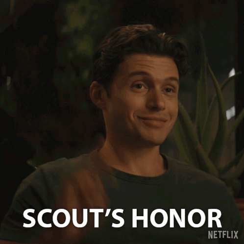 Man in Green Shirt Says Scout's Honor