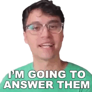 Man in Green Shirt Smiling Saying Im Going to Answer Them