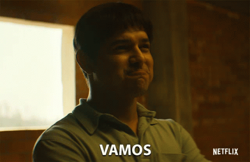 Man in Green Shirt Smiling Saying Vamos