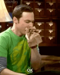 Man In Green Shirt Smoking Cigarette Ok GIF