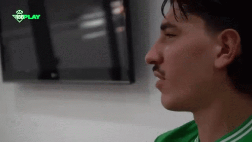 Man in Green Shirt With RBBPLAY