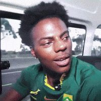 Man In Green Shirt With Yellow Emblem GIF