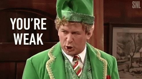 Man in Green Suit and Hat Saying You're Weak