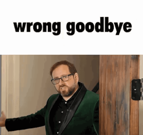 Man in Green Suit Glasses Saying Wrong Goodbye