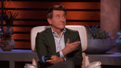 Man In Green Suit Holding Microphone Funny Face GIF