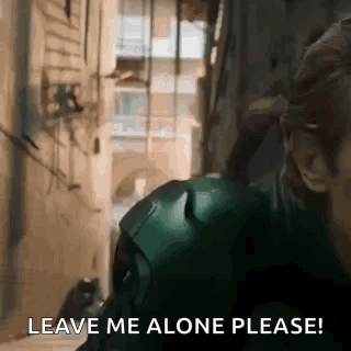 Man in Green Suit Saying Leave Me Alone