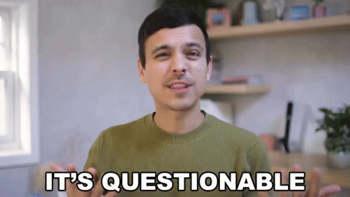 Man in Green Sweater Saying It's Questionable