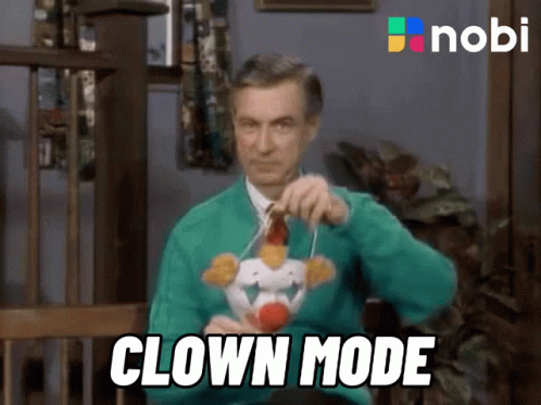 Man in Green Sweater with Stuffed Clown Clown Mode