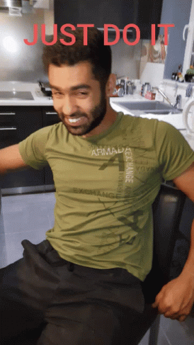 Man in Green T-Shirt Saying Armada Exchange