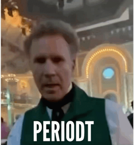 Man in Green Vest and Hat Says Periodt
