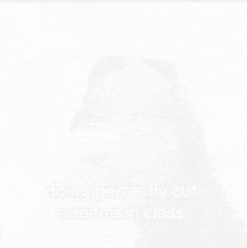 Man In Grey Hoodie Looking At Camera GIF