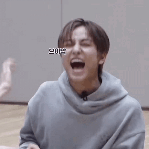 Man in Grey Hoodie Making Funny Face