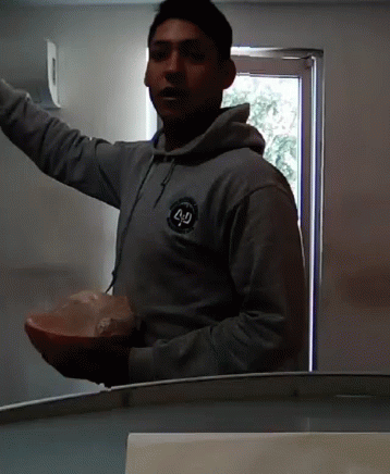 Man in Grey Hoodie Number 40
